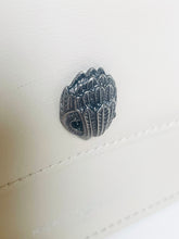 Load image into Gallery viewer, Silver decorative bead on a white fabric background