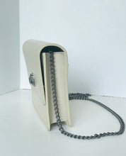 Load image into Gallery viewer, White handbag with a chain detail on a white background