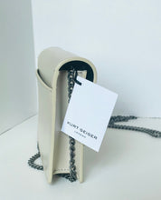 Load image into Gallery viewer, Small cream handbag with a chain detail and Kurt Geiger label on a white background