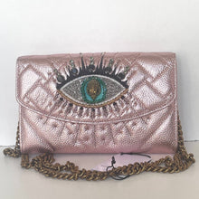 Load image into Gallery viewer, Rose gold handbag with eye design and chain strap on a white background