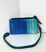 Load image into Gallery viewer, A small blue and teal striped leather wristlet clutch with a matching wrist strap, photographed against a plain white background.