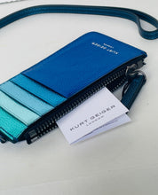Load image into Gallery viewer, A blue Kurt Geiger London crossbody wallet with a gradient design transitioning from deep blue to light teal, shown with its white brand tag on a white surface.