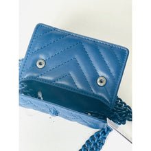 Load image into Gallery viewer, Blue handbag with a chain strap on a white background
