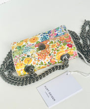 Load image into Gallery viewer, Floral patterned handbag with chain strap on a white background, featuring the brand 'Kurt Geiger'.