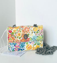 Load image into Gallery viewer, Floral patterned handbag with a chain strap on a white background