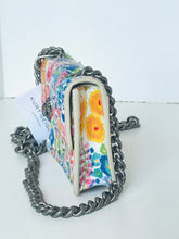 Load image into Gallery viewer, Colorful floral clutch with a chain strap on a white background