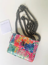Load image into Gallery viewer, Multicolored floral-patterned handbag with a chain strap on a white background