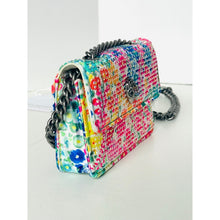 Load image into Gallery viewer, Multicolored floral patterned handbag with black chain strap on a white background