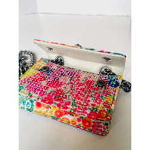 Load image into Gallery viewer, Floral patterned handbag with a chain strap on a white background