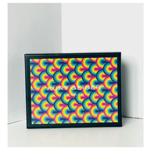 Load image into Gallery viewer, Colorful patterned box with 'Kurt Geiger' branding on a white background