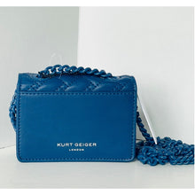 Load image into Gallery viewer, Blue handbag with chain detail and 'Kurt Geiger London' branding on a white background