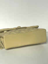 Load image into Gallery viewer, Beige handbag with a textured pattern on a white background