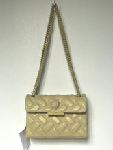 Load image into Gallery viewer, Beige handbag with chain strap on a white background