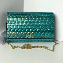 Load image into Gallery viewer, Teal clutch bag with gold chain and 'KGL' monogram on a white background