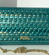 Load image into Gallery viewer, Teal clutch bag with gold chain and 'KGL' monogram on a white background