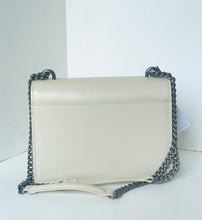 Load image into Gallery viewer, White handbag with black chain strap on a white background