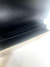 Load image into Gallery viewer, Black electronic device with 'The Shoreditch' branding on a white background