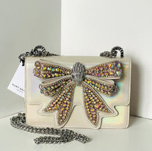 Load image into Gallery viewer, Handbag with a decorative bow and crystals on a light background