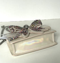Load image into Gallery viewer, Silver clutch with butterfly design on a white background