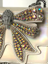Load image into Gallery viewer, Decorative bow with rhinestones on a neutral background