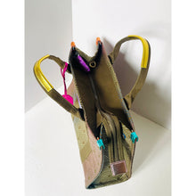 Load image into Gallery viewer, Multicolored hydration backpack on a white background
