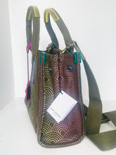 Load image into Gallery viewer, Patterned handbag with a visible brand tag on a white background