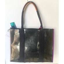 Load image into Gallery viewer, Black tote bag with a reflective surface on a white background