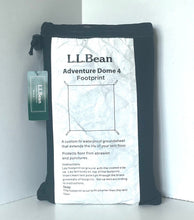 Load image into Gallery viewer, A black fabric footprint dome with a white printed insert card and a green L.L.
