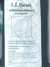 Load image into Gallery viewer, A crumpled white paper insert for an L.L.