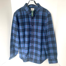 Load image into Gallery viewer, Blue plaid shirt on a hanger against a white background