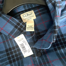 Load image into Gallery viewer, Close-up of a blue plaid shirt with an L.L.Bean tag on a white background