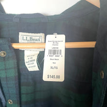 Load image into Gallery viewer, Green plaid shirt on a hanger with L.L.Bean tag and price label.