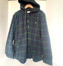 Load image into Gallery viewer, Plaid jacket with hood on a wooden hanger against a white background