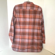 Load image into Gallery viewer, Plaid shirt on a hanger against a white wall