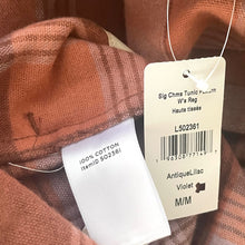 Load image into Gallery viewer, Close-up of a fabric with a tag displaying product details.