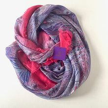 Load image into Gallery viewer, Multicolored patterned scarf with a visible brand tag on a white background