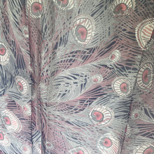 Load image into Gallery viewer, Close-up of fabric with intricate peacock feather pattern