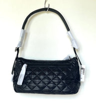 Load image into Gallery viewer, Black quilted handbag on a hanger with tags