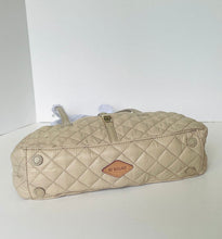 Load image into Gallery viewer, Beige quilted handbag with a visible brand logo on a white background