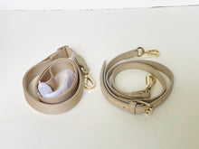 Load image into Gallery viewer, Two beige dog leashes with gold clasps on a white background