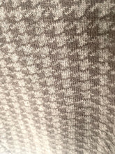 Load image into Gallery viewer, Close-up of textured fabric with a pattern