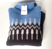 Load image into Gallery viewer, Folded black and blue sweater with a tag on a white surface