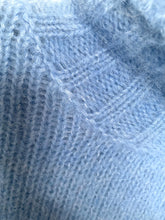Load image into Gallery viewer, Close-up of textured blue fabric with a subtle pattern