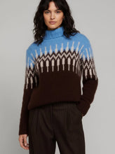 Load image into Gallery viewer, Person wearing a brown and blue patterned sweater against a gray background