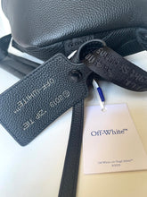 Load image into Gallery viewer, Off-White bag with tags and a card on a white background