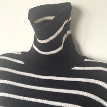Load image into Gallery viewer, Black and white striped turtleneck sweater on a mannequin against a white background