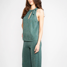 Load image into Gallery viewer, Woman wearing a green sleeveless top and pants set on a white background