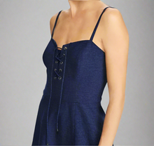 Load image into Gallery viewer, Navy blue sleeveless dress with lace-up front on a white background