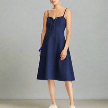 Load image into Gallery viewer, Woman wearing a navy blue dress on a white background