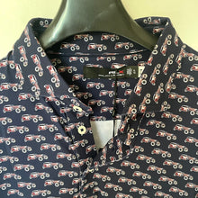 Load image into Gallery viewer, Navy shirt with vintage truck pattern on a hanger against a light background